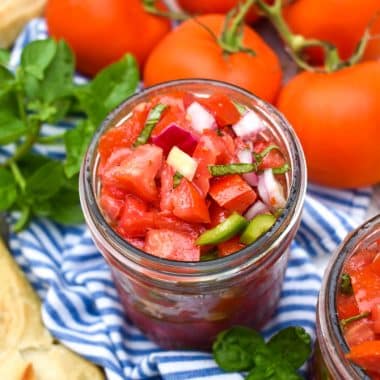 bruschetta style salsa in a glass mason jar