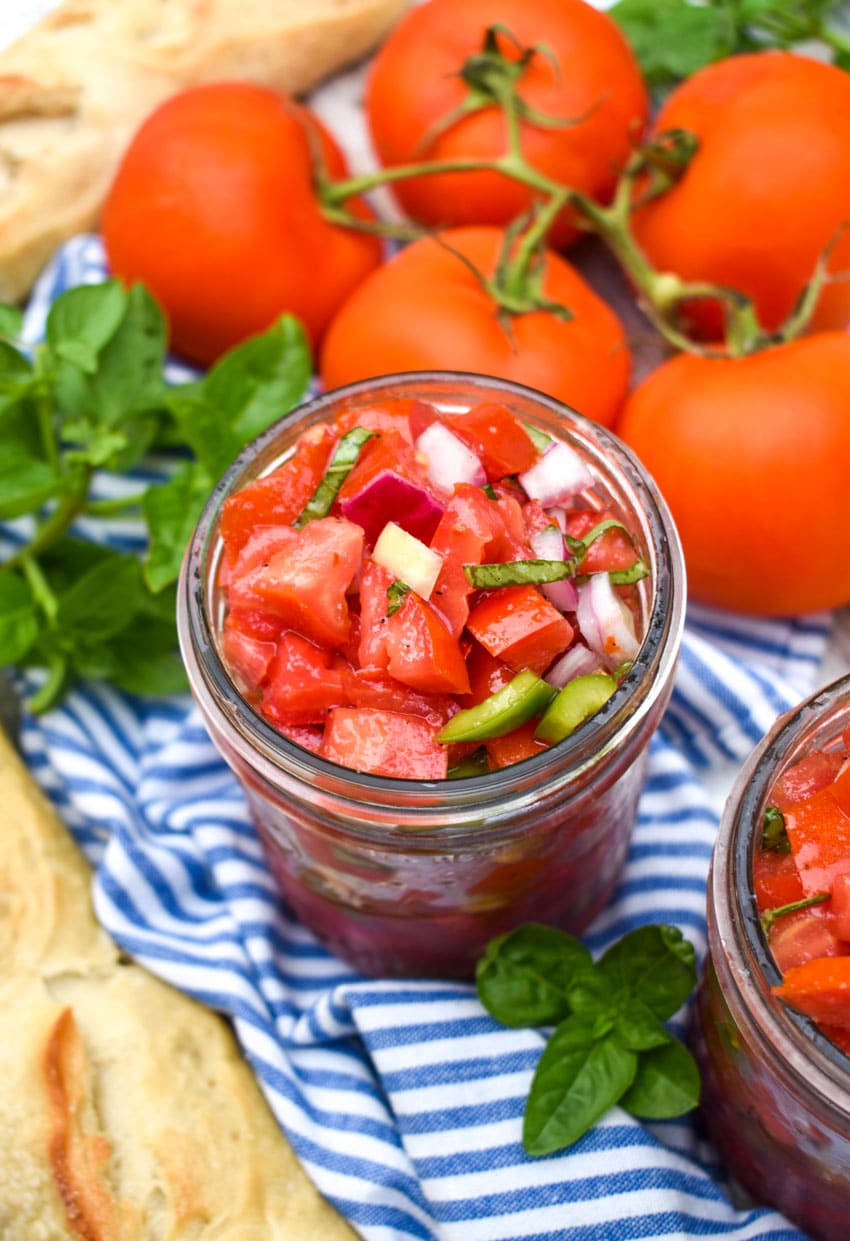 bruschetta style salsa in a glass mason jar
