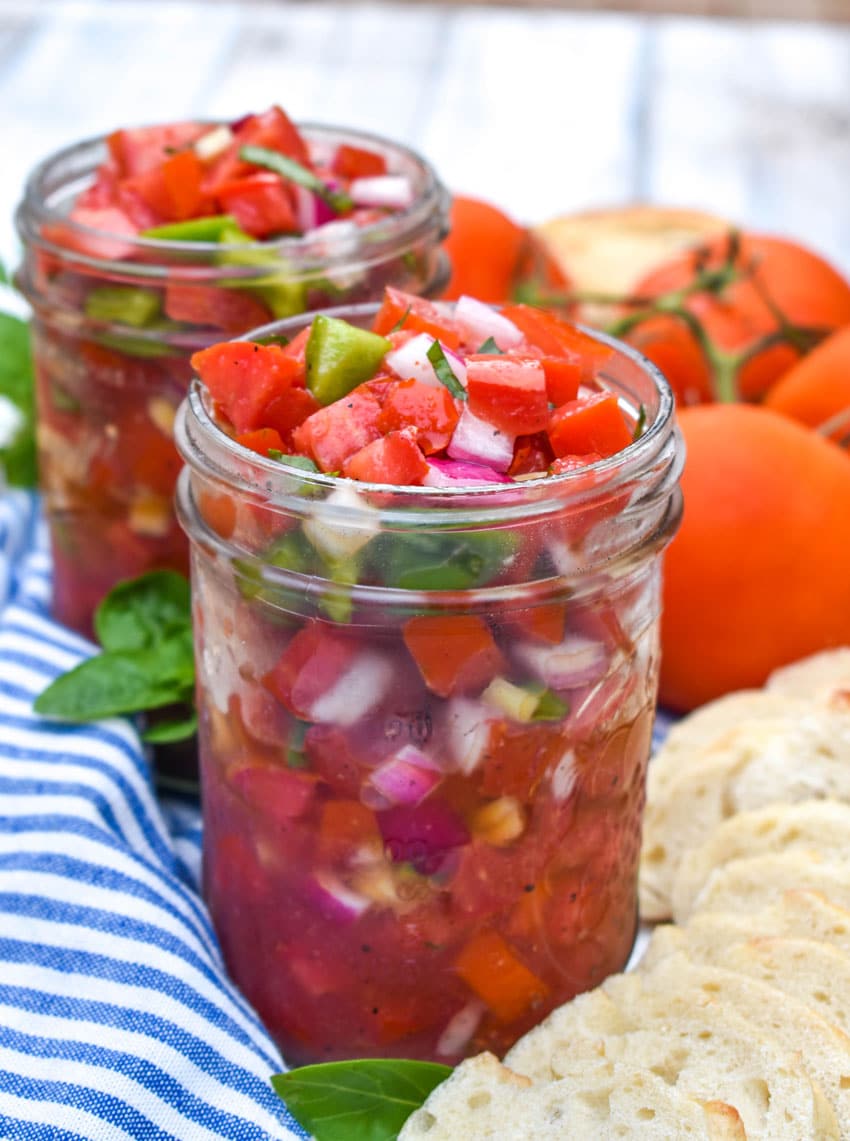 easy Italian salsa cruda in small glass jars