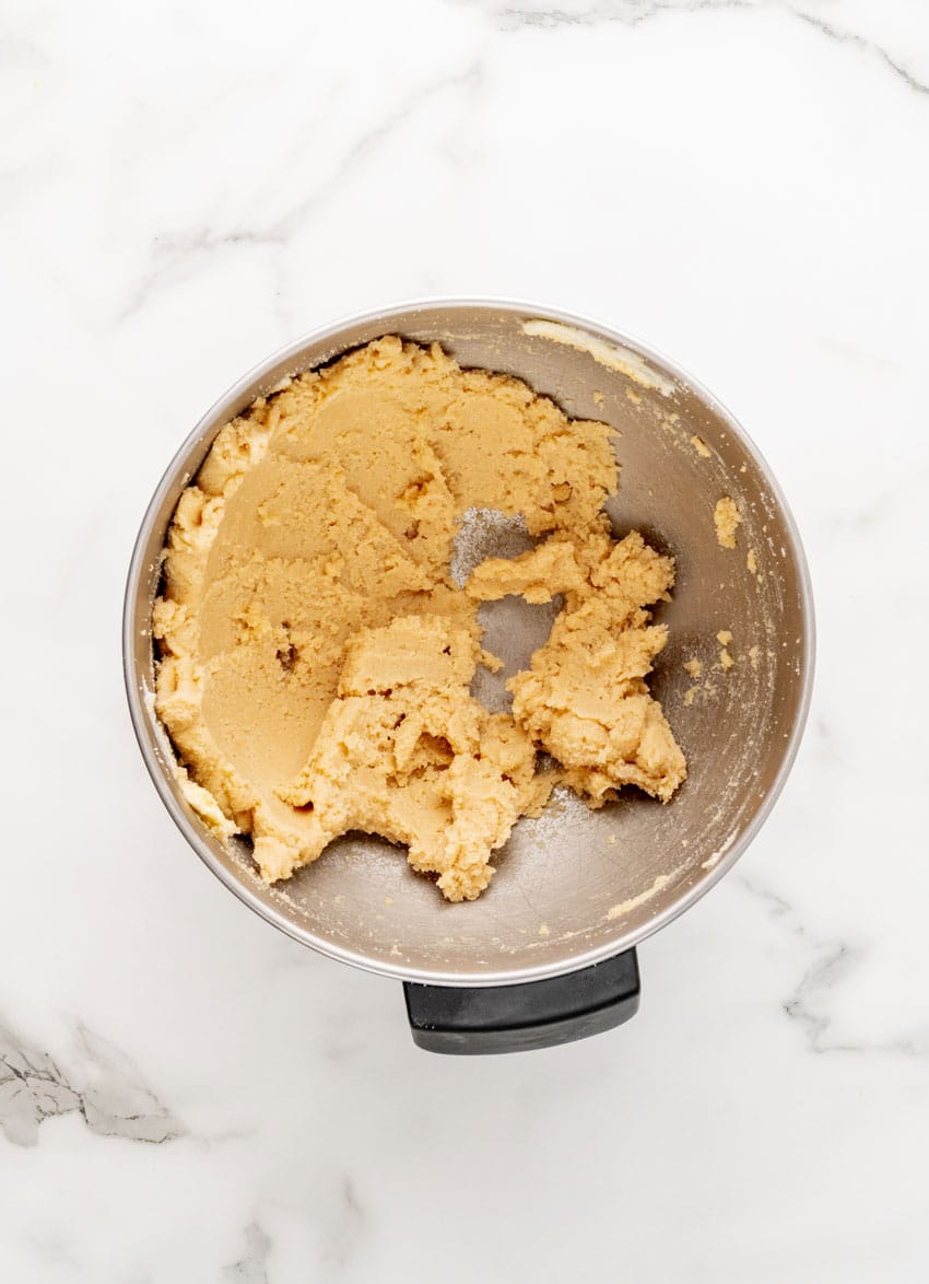 butter and sugar creamed together in a metal mixing bowl