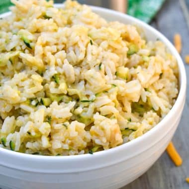 one pot cheesy zucchini rice in a white bowl