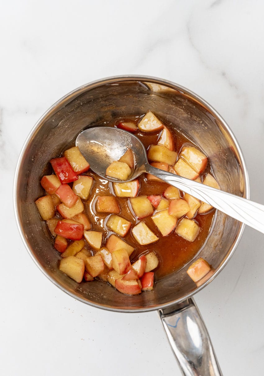 candied apple topping for pancakes in a metal mixing bowl