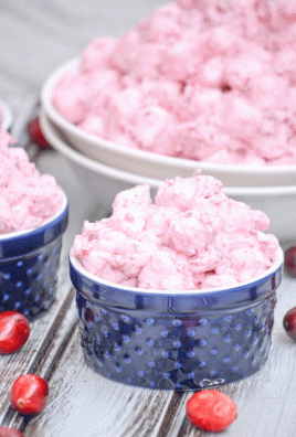 cranberry fluff salad in a tiny blue bowl
