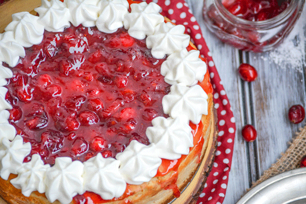 Cranberry Sauce Topped Eggnog Cheesecake