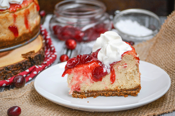 Cranberry Sauce Topped Eggnog Cheesecake