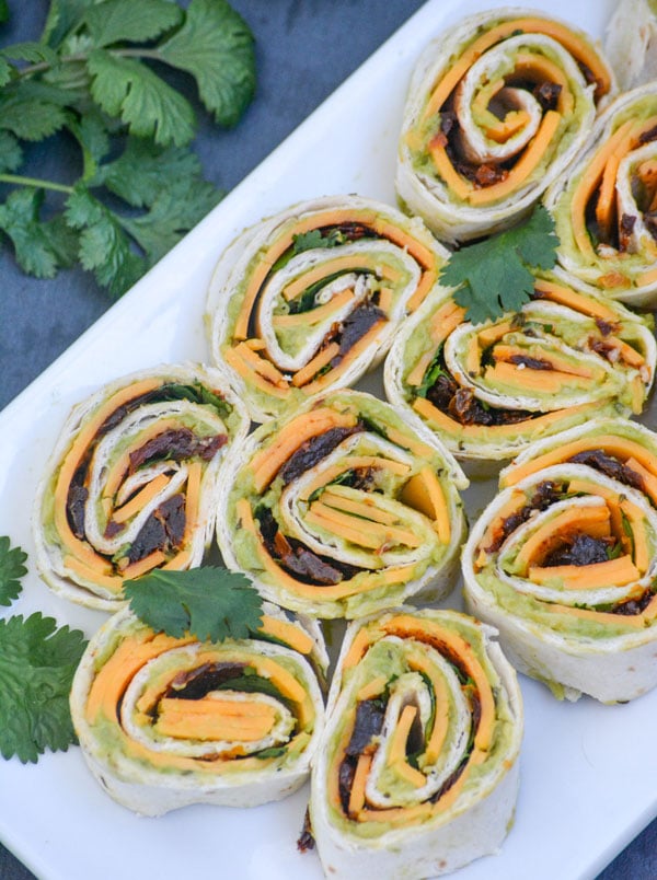 Chipotle Cheddar Garlic Herb Avocado Pinwheels