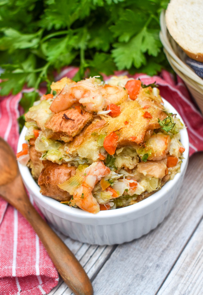 seafood stuffing in a small white ramekin