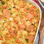 baked seafood stuffing in a white casserole dish