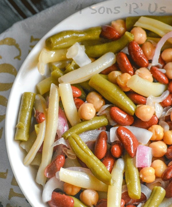 four bean salad in a white bowl