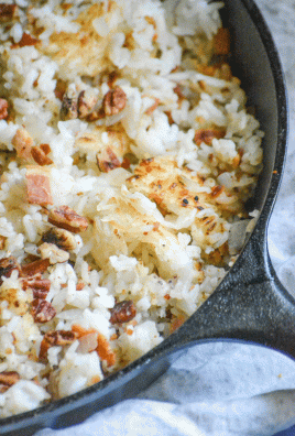 butter bacon crunch rice in a black cast iron skillet