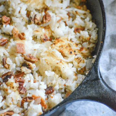 butter bacon crunch rice in a black cast iron skillet