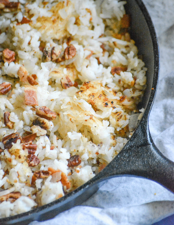 butter bacon crunch rice in a black cast iron skillet