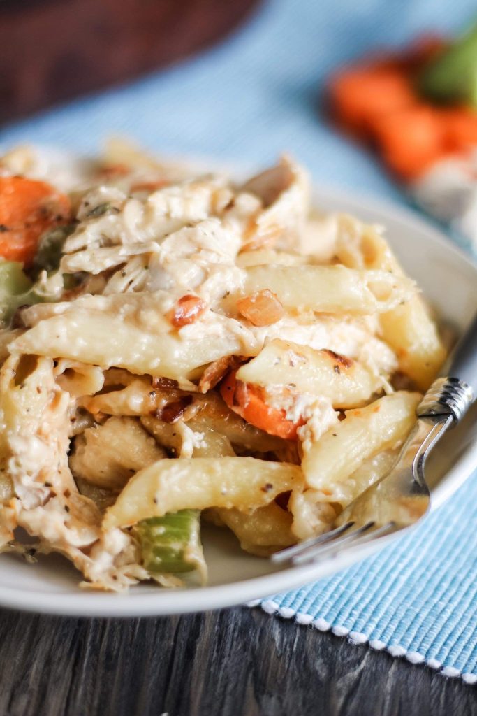 chicken noodle soup casserole served on a white plate