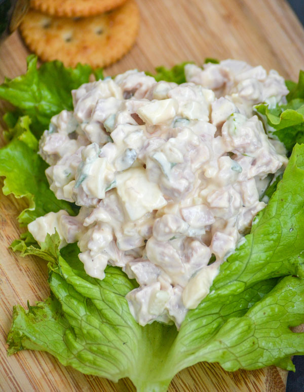 creamy dijon mustard ham salad served on green lettuce leaves