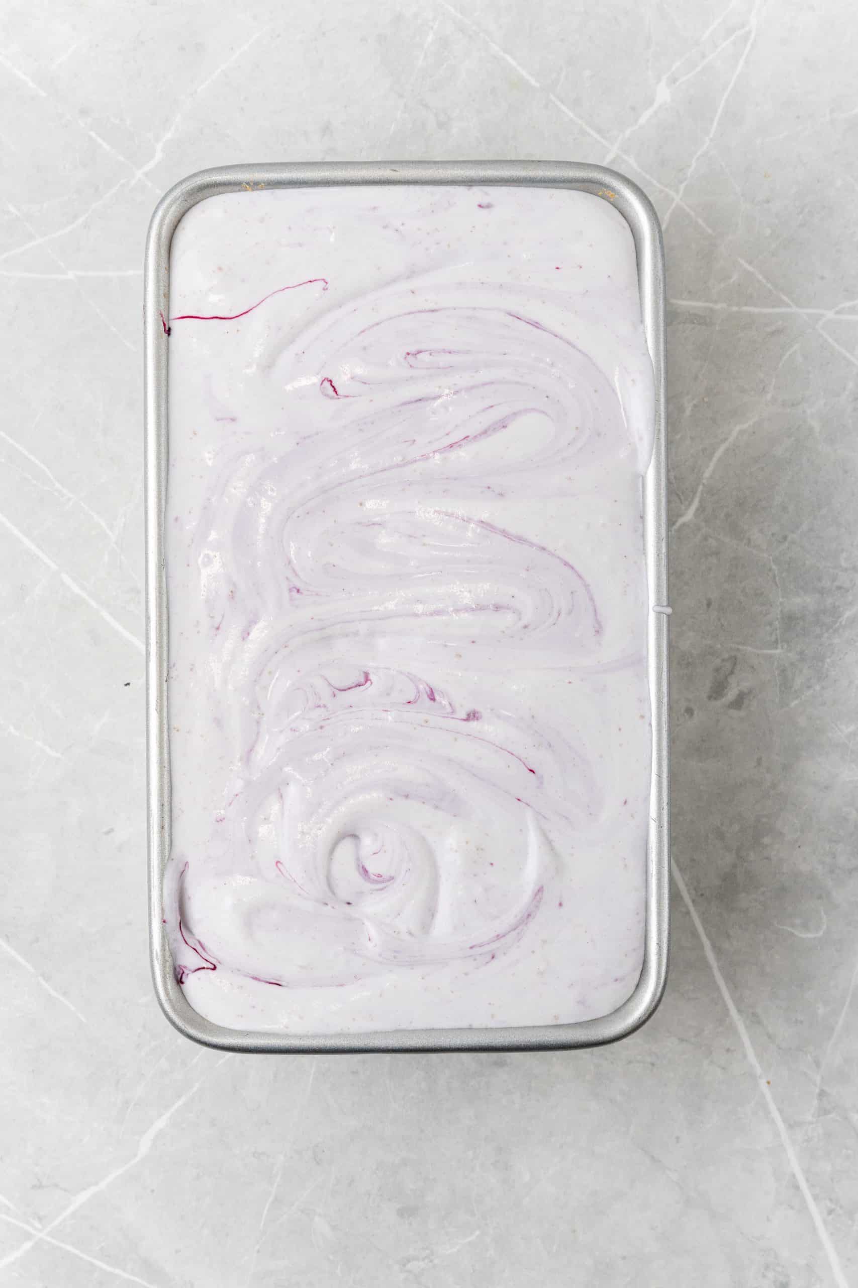 no churn blueberry muffin ice cream in a metal loaf pan