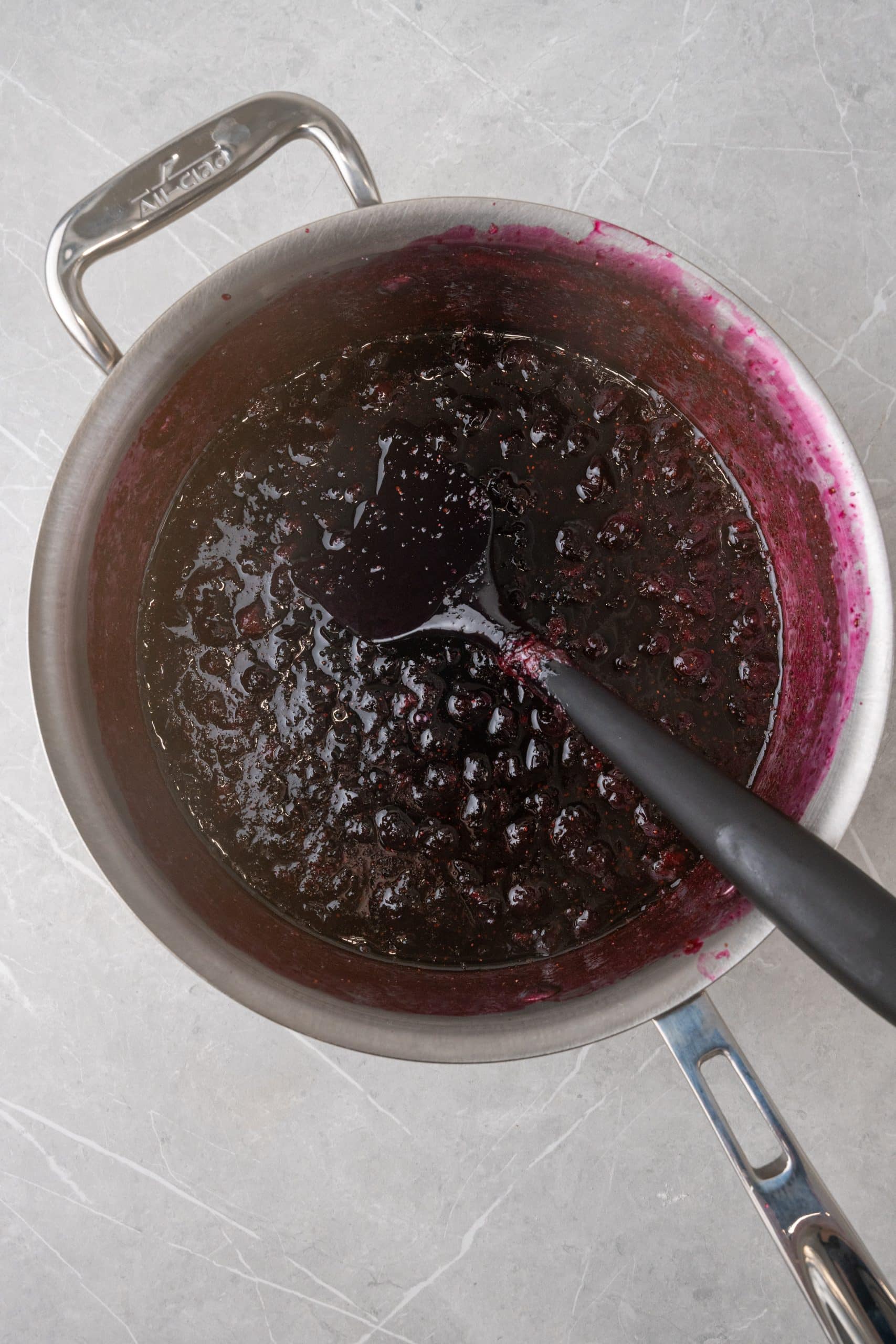 homemade blueberry compote in a metal pot