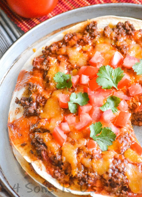 double decker mexican pizza on a silver pizza pan