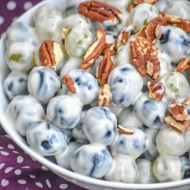 SOUTHERN SOUR CREAM GRAPE SALAD IN A WHITE BOWL