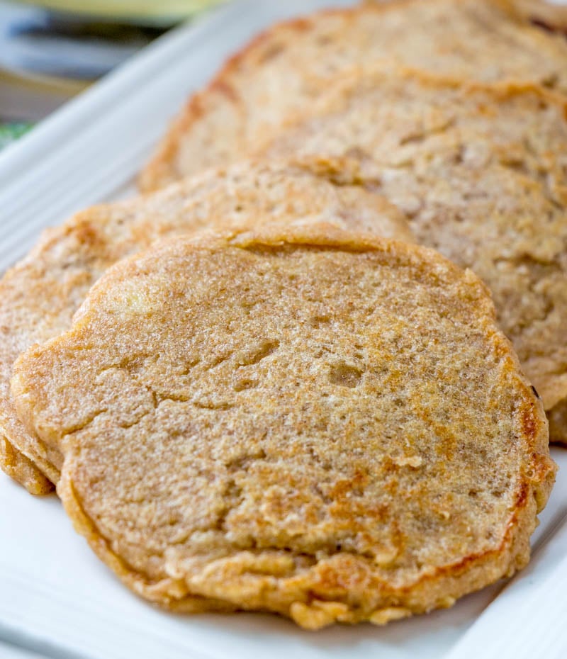 pancakes for babies and toddlers using baby cereal, purees, and formula or whole milk on a white serving dish