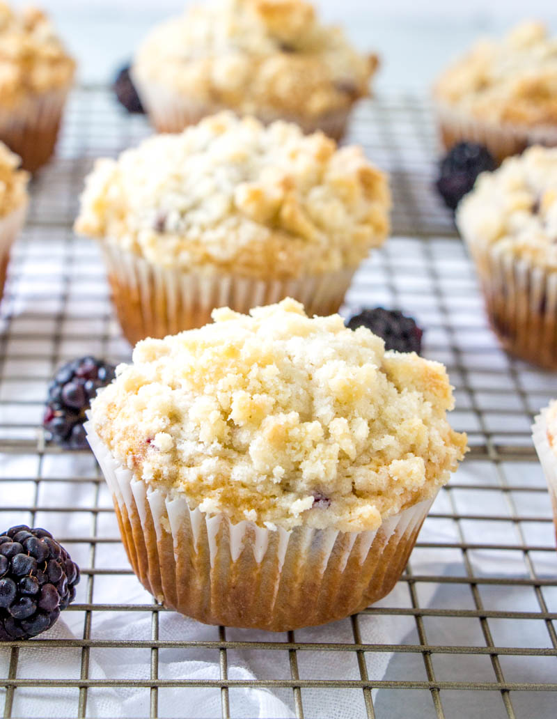 BLACKBERRY COBBLER MUFFINS ON A WIRE COOLING RACK