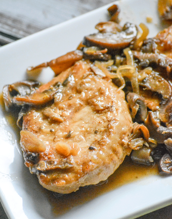 Pork Chops in a savory marsala wine sauce with caramelized shallot onions and soft sauteed mushrooms