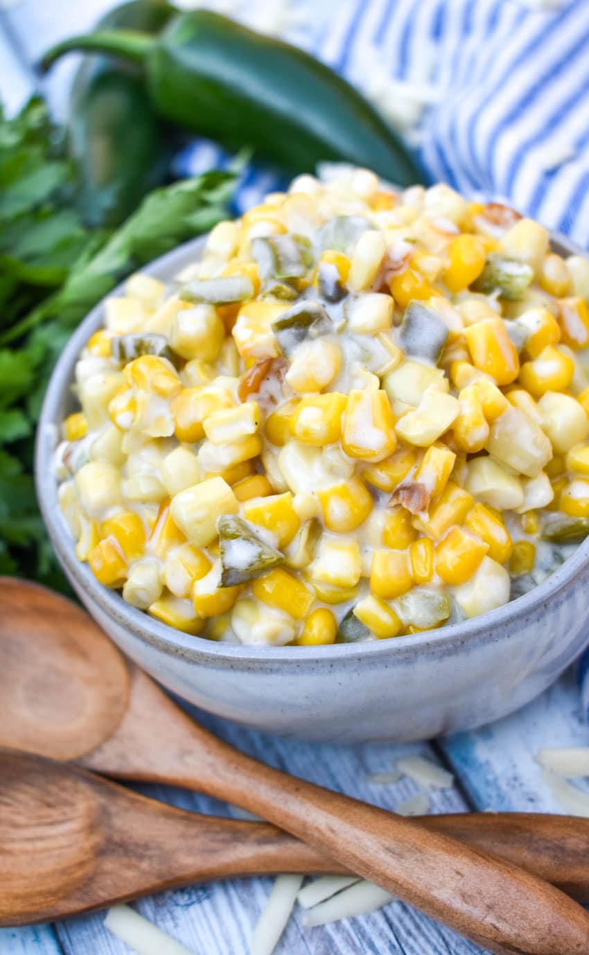 smoked jalapeno cheddar creamed corn in a small gray bowl