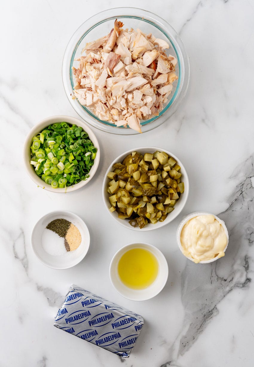 an overhead image showing the measured ingredients needed to make dill pickle chicken salad