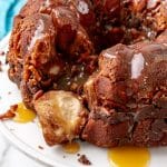 chocolate monkey bread on a white cake stand