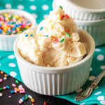 creamy 5 minutes ice cream in a bag in a white ramekin and topped with rainbow sprinkles