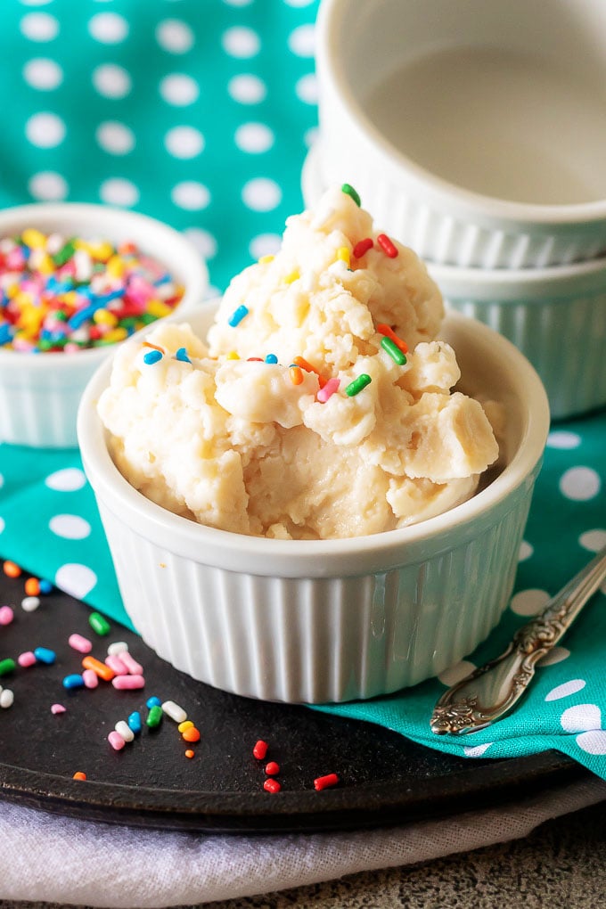 creamy 5 minutes ice cream in a bag in a white ramekin and topped with rainbow sprinkles