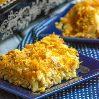 rotisserie chicken & rice casserole served on a small blue square plate