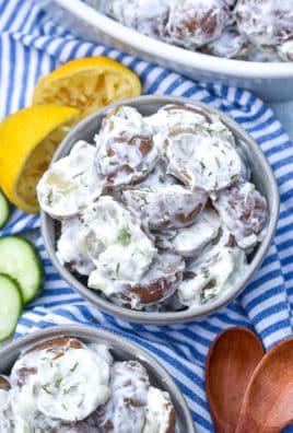 tzatziki potato salad in two small gray bowls
