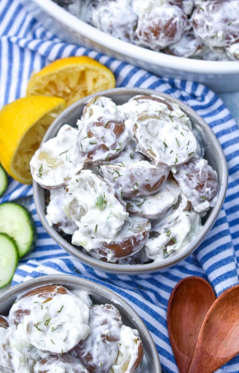 tzatziki potato salad in two small gray bowls