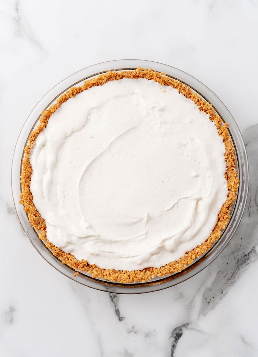 softened ice cream spread in a gingersnap cookie pie crust