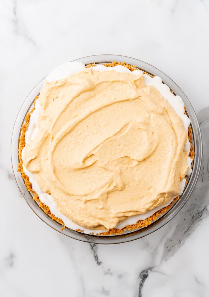 pumpkin ice cream pie on a marble countertop