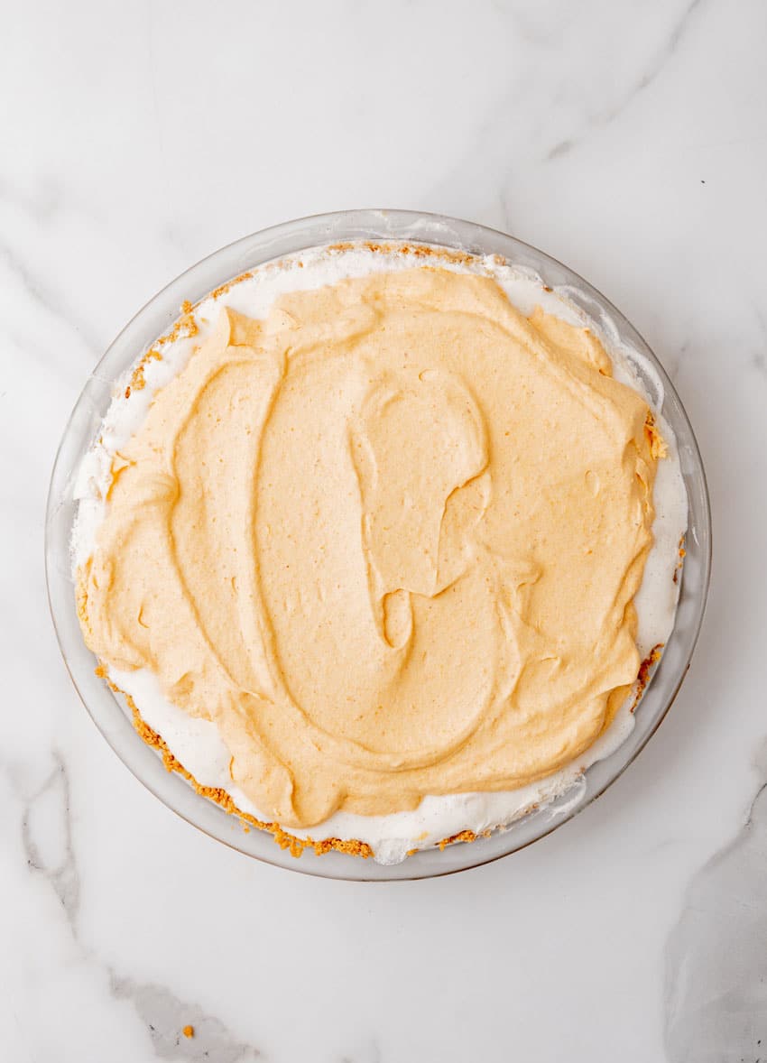 pumpkin ice cream pie on a marble countertop