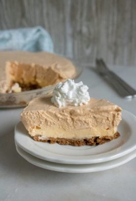 pumpkin ice cream pie slice shown on a white plate