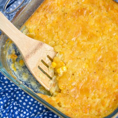 Southern creamed corn pudding in a square glass baking dish