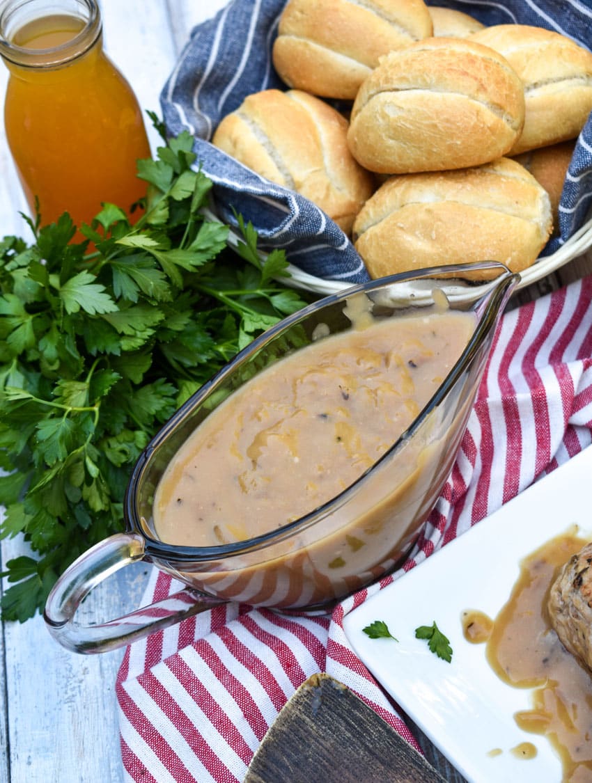 apple cider gravy in a glass gravy boat