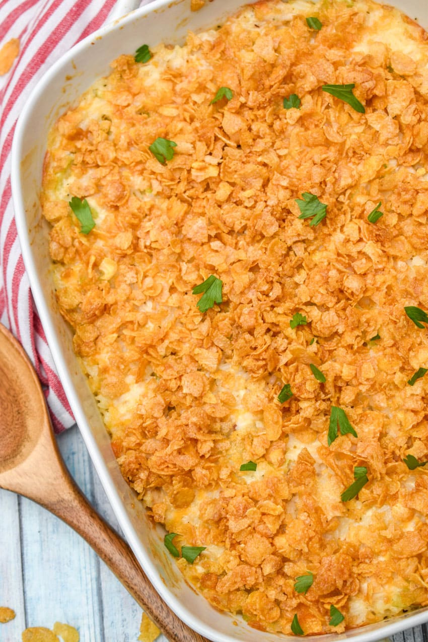 rotisserie chicken and rice casserole in a white baking dish