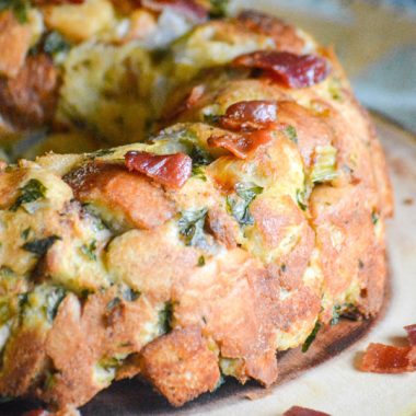 SAVORY BUNDT PAN STUFFING ON A WOODEN SERVING PLATTER