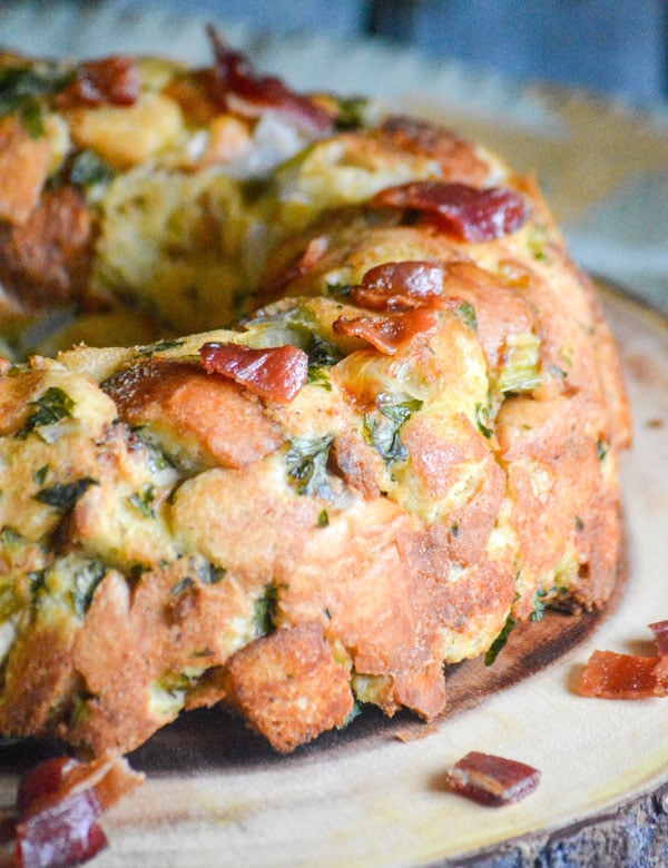 SAVORY BUNDT PAN STUFFING ON A WOODEN SERVING PLATTER