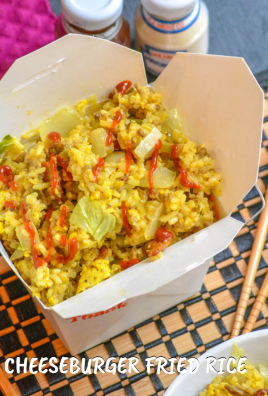 cheeseburger fried rice in a paper chinese food container with wooden chop sticks on the side