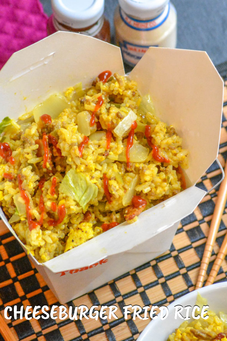 cheeseburger fried rice in a paper chinese food container with wooden chop sticks on the side