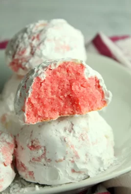 peppermint snowballs cookies on a white plate