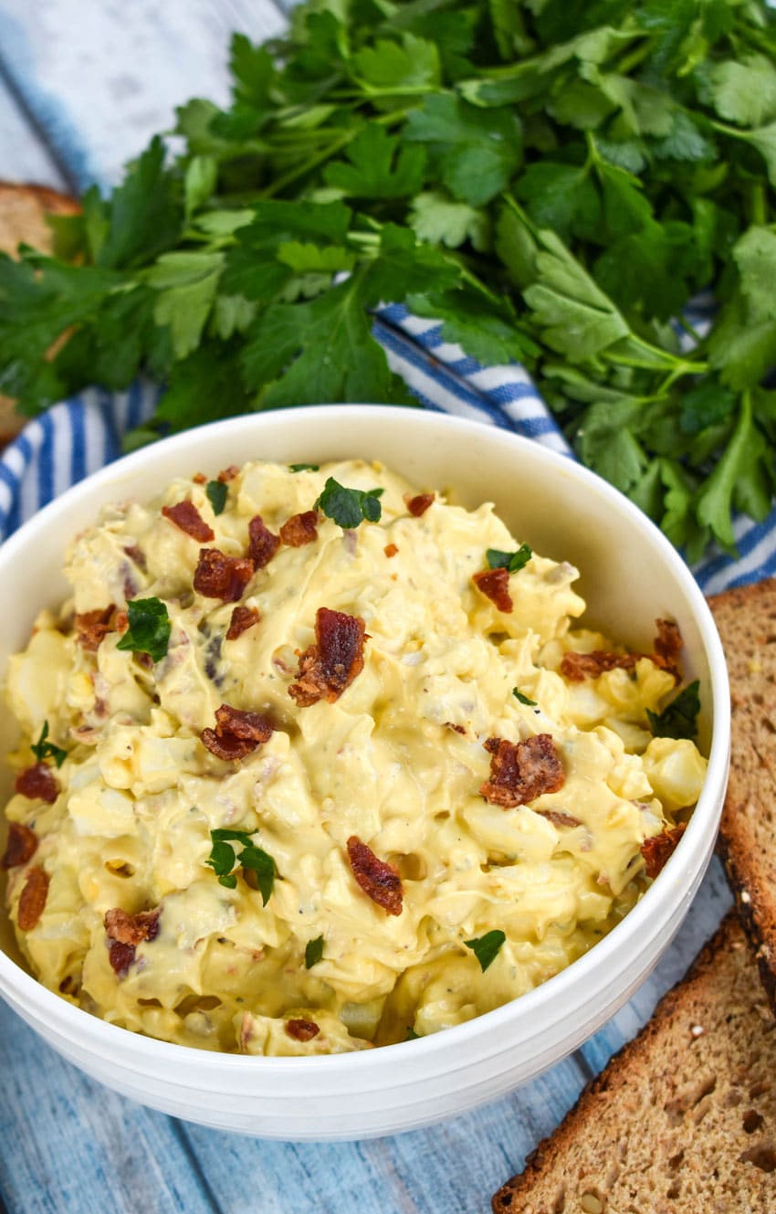 bacon ranch egg salad in a white bowl