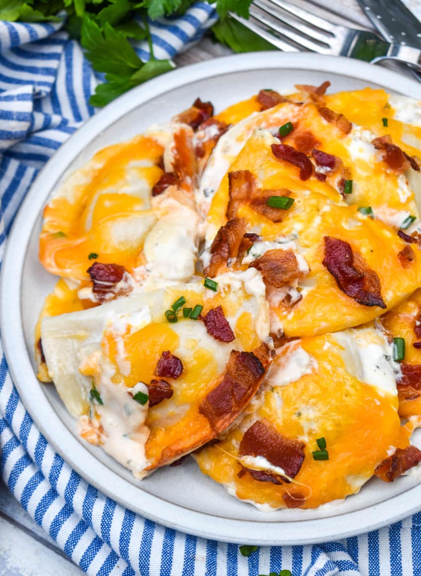 cheddar bacon ranch pierogi bake on a white plate