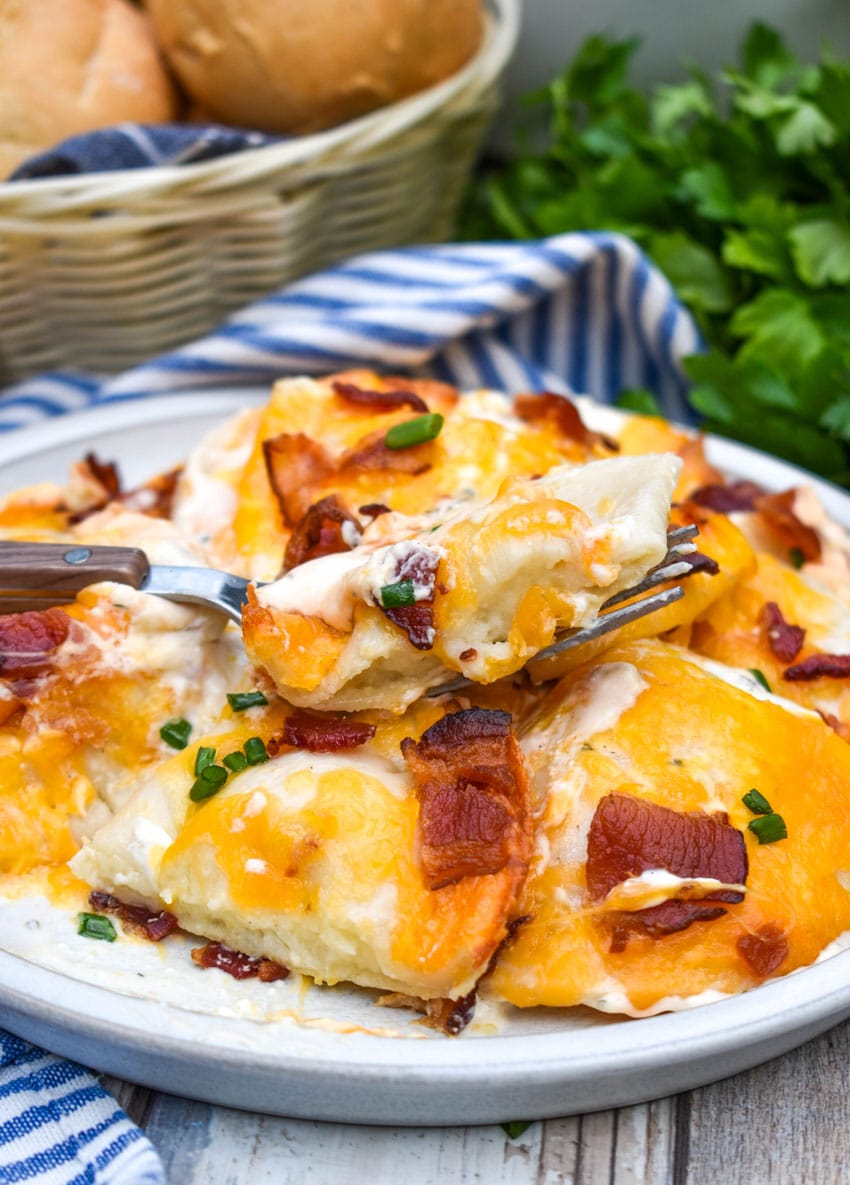 cheddar bacon ranch pierogi bake on a white plate