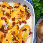 cheddar bacon ranch pierogi bake in a white casserole dish