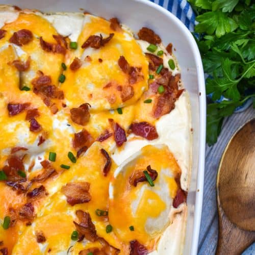 cheddar bacon ranch pierogi bake in a white casserole dish